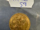 a close up of a gold coin in a plastic bag