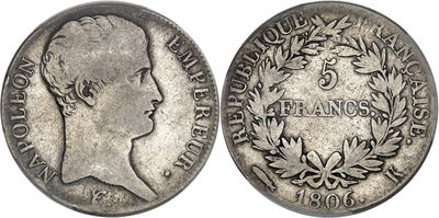 a close up of a coin with a woman ' s face on it