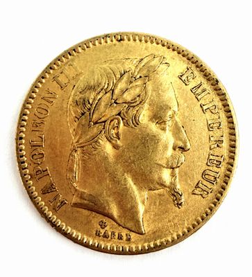 l'image d'une pièce d'or sur laquelle figure le visage d'un homme