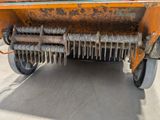a close up of a machine that is on the ground