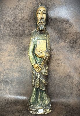an image of a statue of a man with a book in his hands