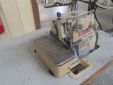 a sewing machine that is sitting on a table