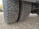 a close up of a tire on a truck