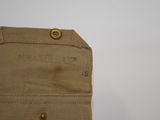 a close up of a pocket with a button on it