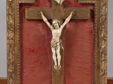 a wooden cross with a crucifix on it