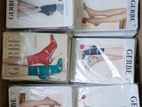 six pairs of women ' s shoes in a cardboard box