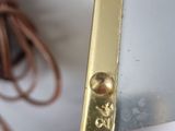 a close up of a pair of scissors on a table