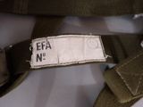a label on the back of a belt that says eeza no
