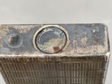 a close up of a metal object with a hole in it