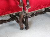 an image of a red chair with a red upholstered seat