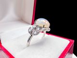 a ring that is sitting in a box on a table