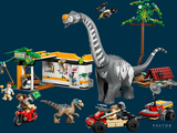 a toy set of dinosaurs and people in front of a building
