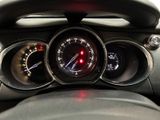 a close up of a car dashboard with various gauges