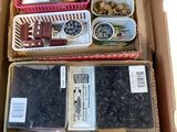 a box of assorted items sitting on a table