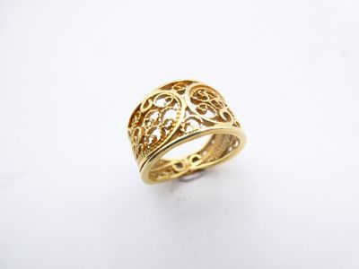 an 18k yellow gold ring with filigree design