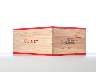 a wooden box with a red lid on a table