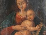 un tableau représentant une femme tenant un bébé et un livre