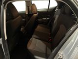 the interior of a car with the door open and the passenger seat down