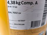 a close up of a yellow container with a barcode on it