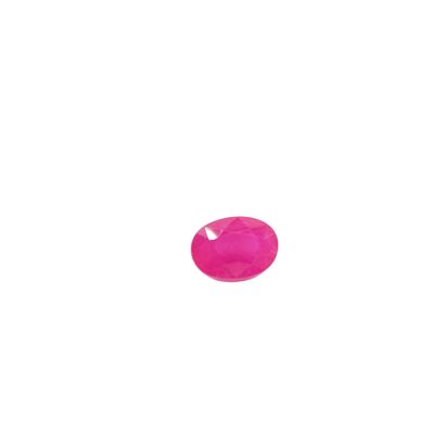 a close up of a pink gemstone on a white background