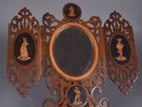 an image of a mirror with a picture of a man and a woman on it