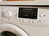 an image of a washer and dryer in a kitchen