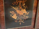 a wooden cabinet with a floral design on it