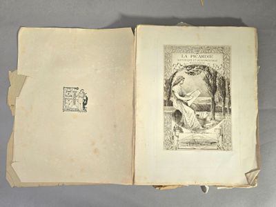 un livre ouvert sur lequel figure l'image d'un homme et d'un chien