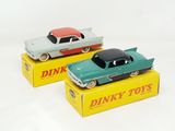 three toy cars that are sitting on top of a box