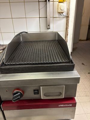 an image of a commercial grill in a commercial kitchen