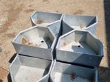 a pile of trash sitting on the side of the road