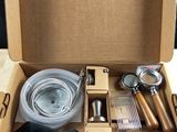a box with a variety of kitchen utensils in it