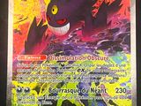 a close up of a pokemon card on a table