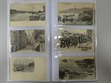 several old black and white photos of people and boats on a table