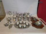 a lot of silver items on the table