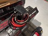 a box with a couple of wires on top of it
