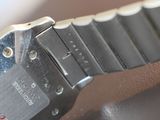 a close up of a watch that is on a table