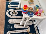 a small table with toys on it in a room