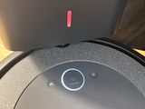 a close up of a robot sitting on top of a table