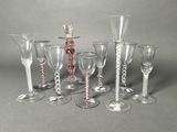 a group of wine glasses sitting on a table