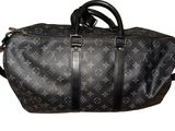 louis vuitton monogram canvas and leather duffle bag