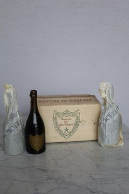 three bottles of wine sitting next to each other on a table