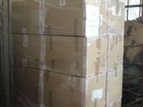 a large stack of boxes sitting on a pallet in a warehouse