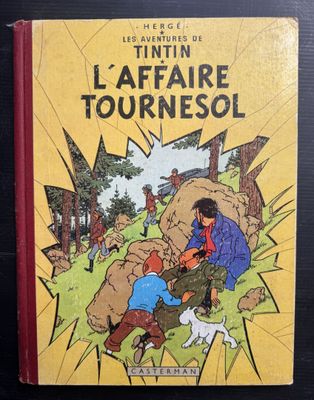 un livre avec l'image d'un homme et d'un chien