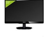 the monitor is black and has a green sticker on it