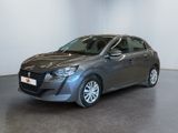 a picture of a grey car parked in a room
