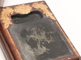 a small wooden box with a picture inside of it