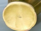 an image of a vase with a lid on a table