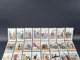 several cards with pictures of people and animals on them on a black background