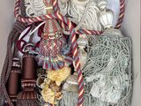 a box filled with different types of rope and other items